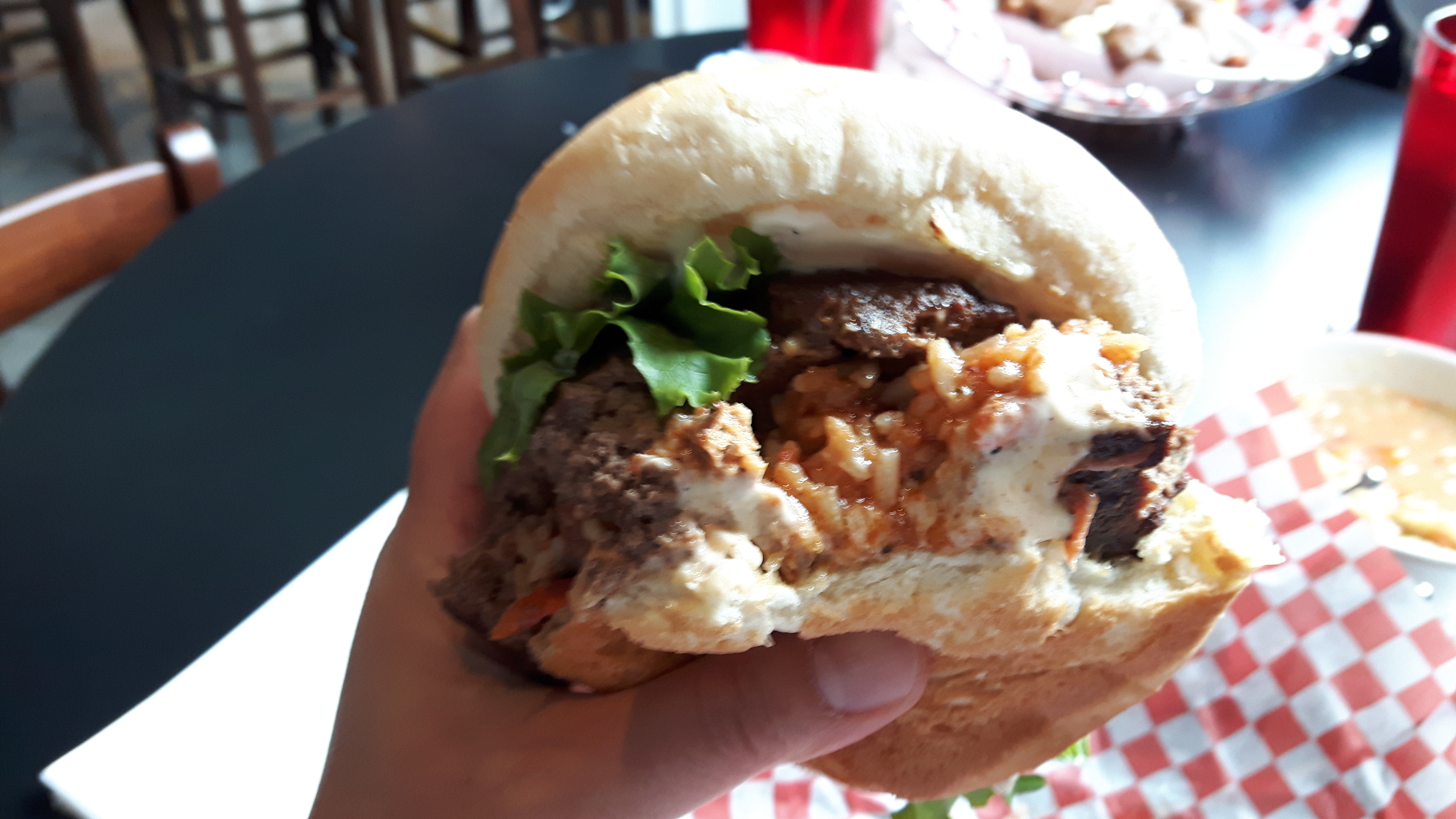 Second bite of the stuffed jambalaya burger