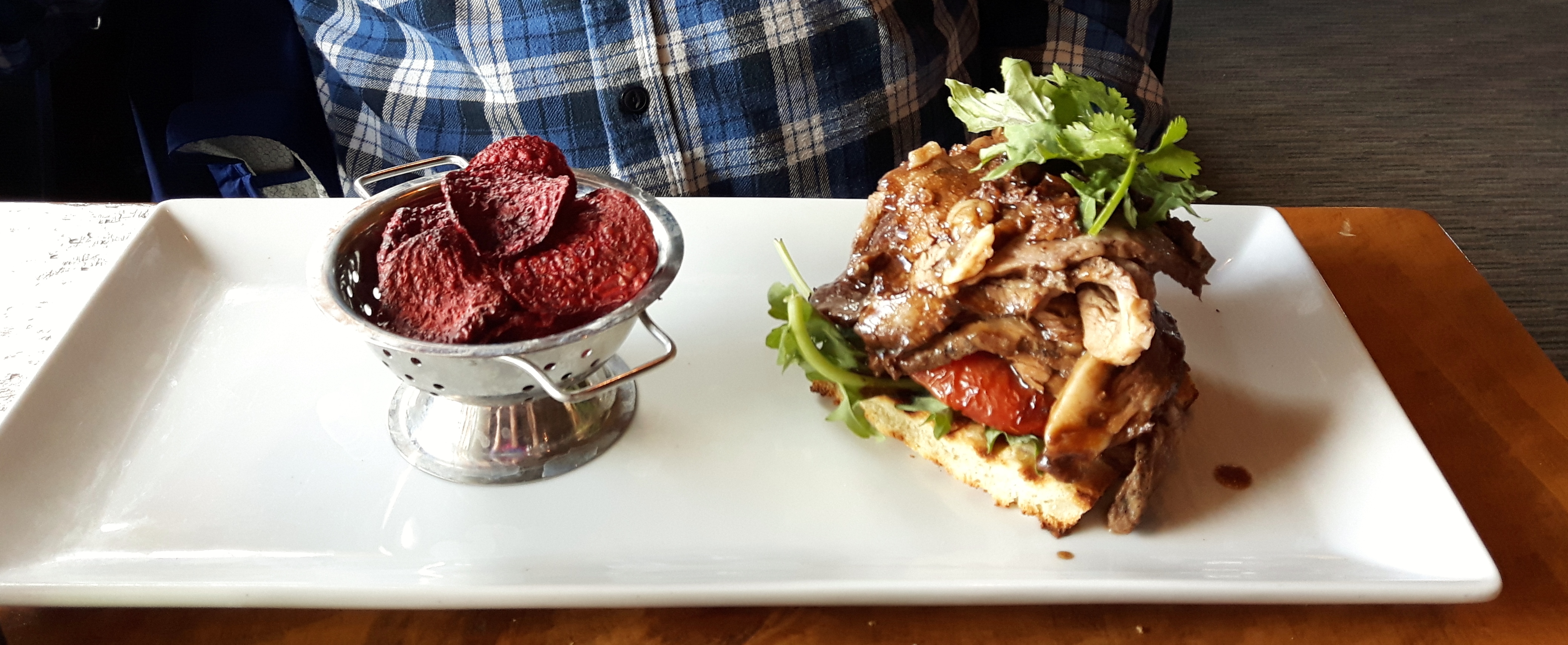 Shaved Prime Rib Sandwich Roasted Roma Tomatoes - Arugula Horseradish and Honey Marscapone - Beet Chips